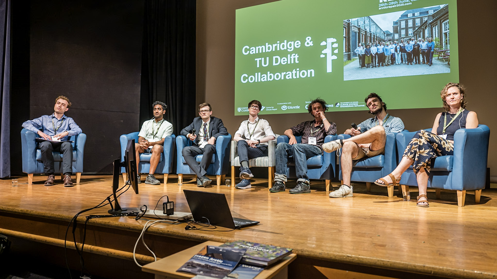 Panelists on stage at Arctic Repair