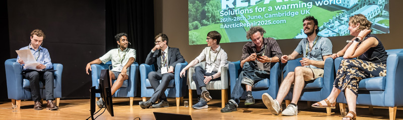 Early-career researchers in armchairs on stage at Arctic Repair