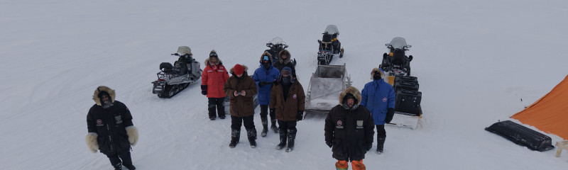 Research team on Arctic ice from above