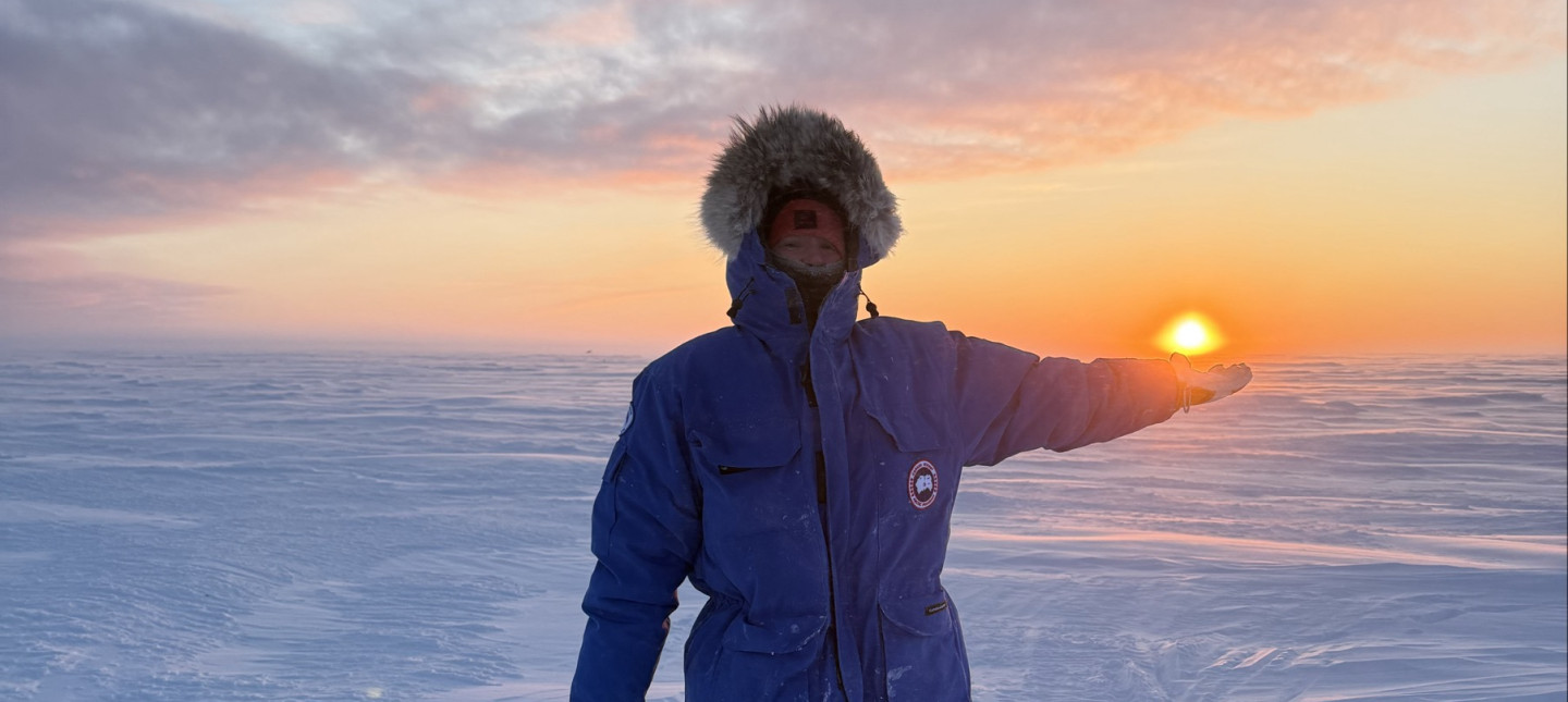 Faye holding the sun in the Arctic