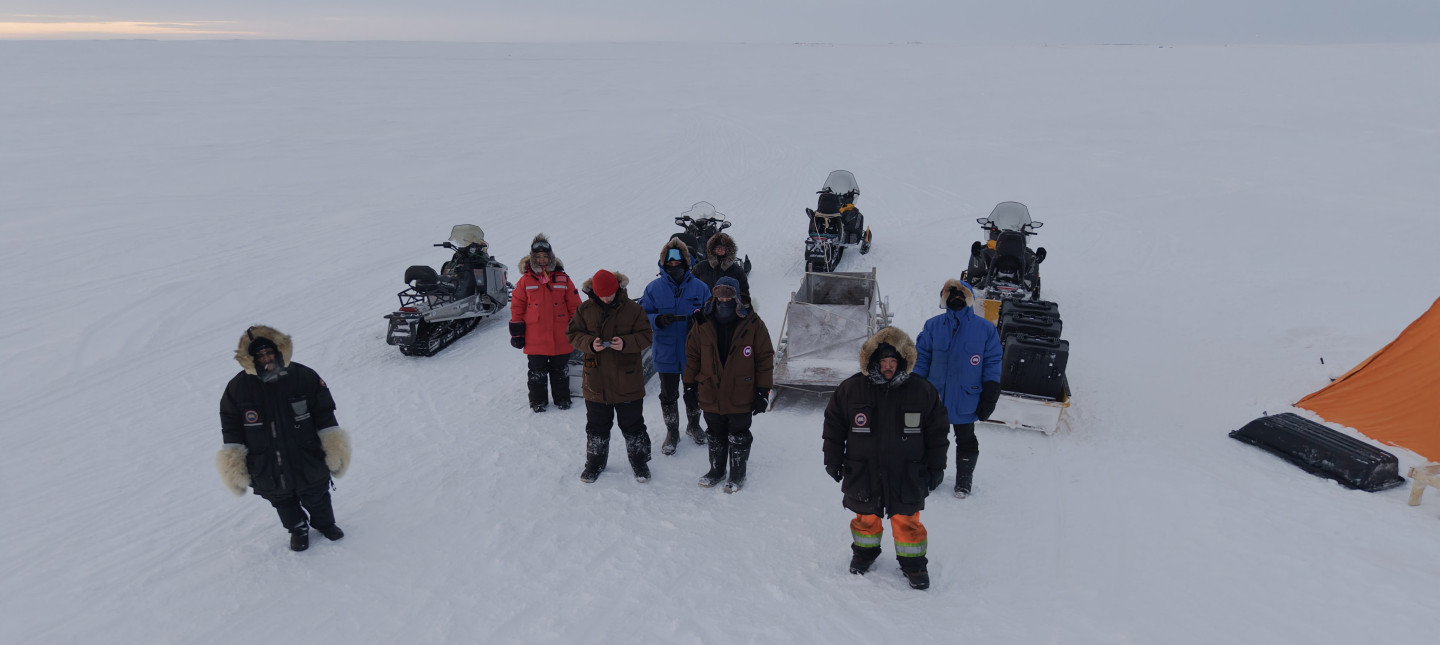 Research team on Arctic ice from above