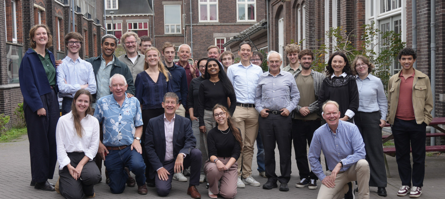 Delft and Cambridge teams in a group photo