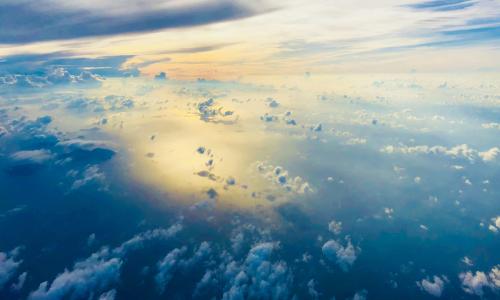 Photo of sunrise from space. Photo by John Cameron on Unsplash