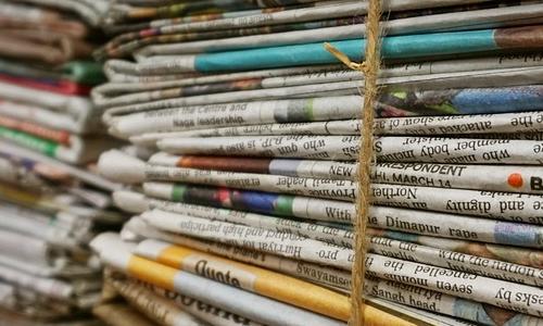 Image by Pexels from Pixabay. Picture of bundle of newspapers