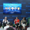 5 panelists seated at COP30