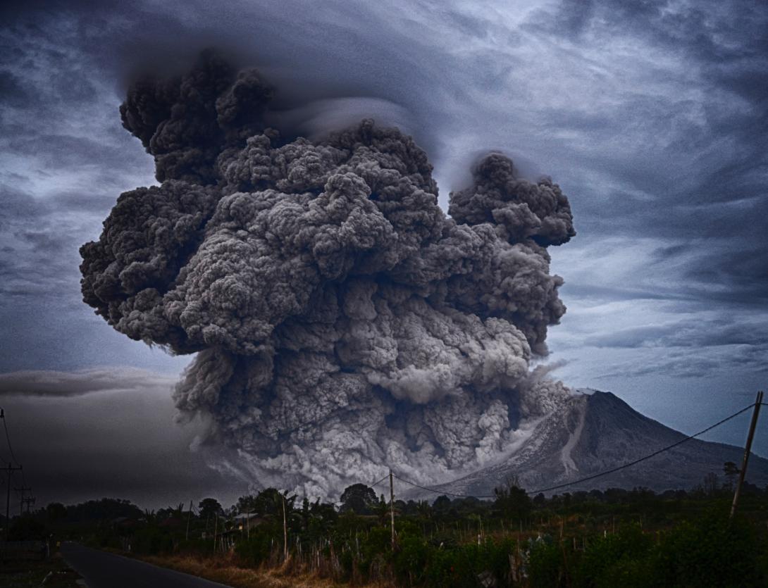 Picture of a volcano erupting. Photo by Yosh Ginsu on Unsplash