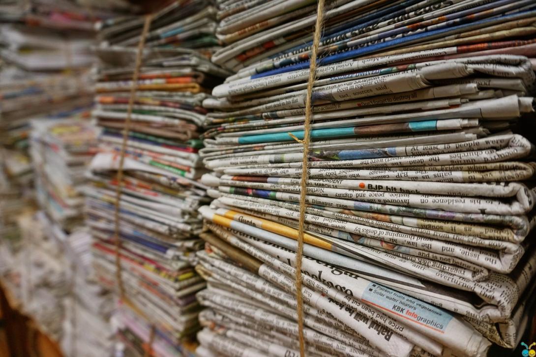 Image by Pexels from Pixabay. Picture of bundle of newspapers