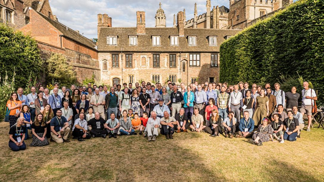 Attendees in group photo at Trinity College