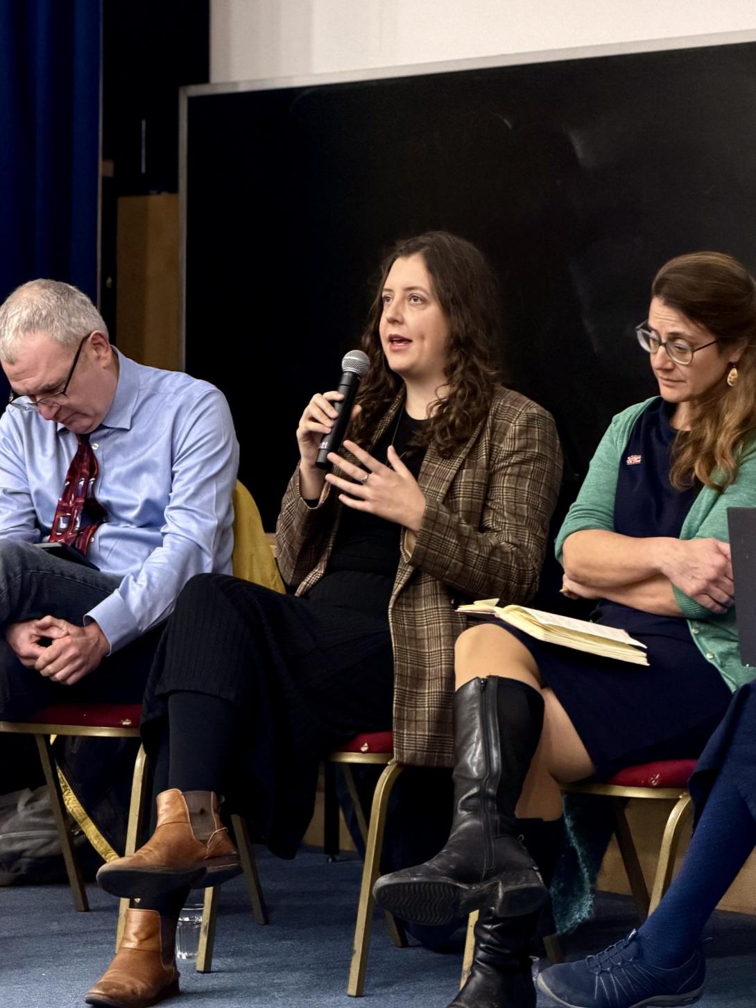 Woman speaking on panel