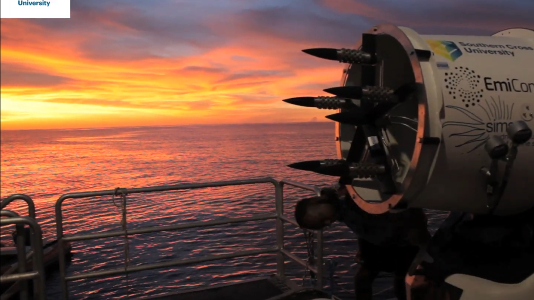 Sprayer on boat in the sunset