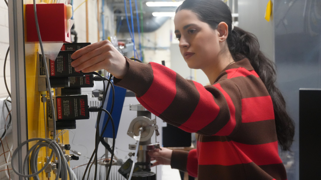 Researcher adjusting device in the lab