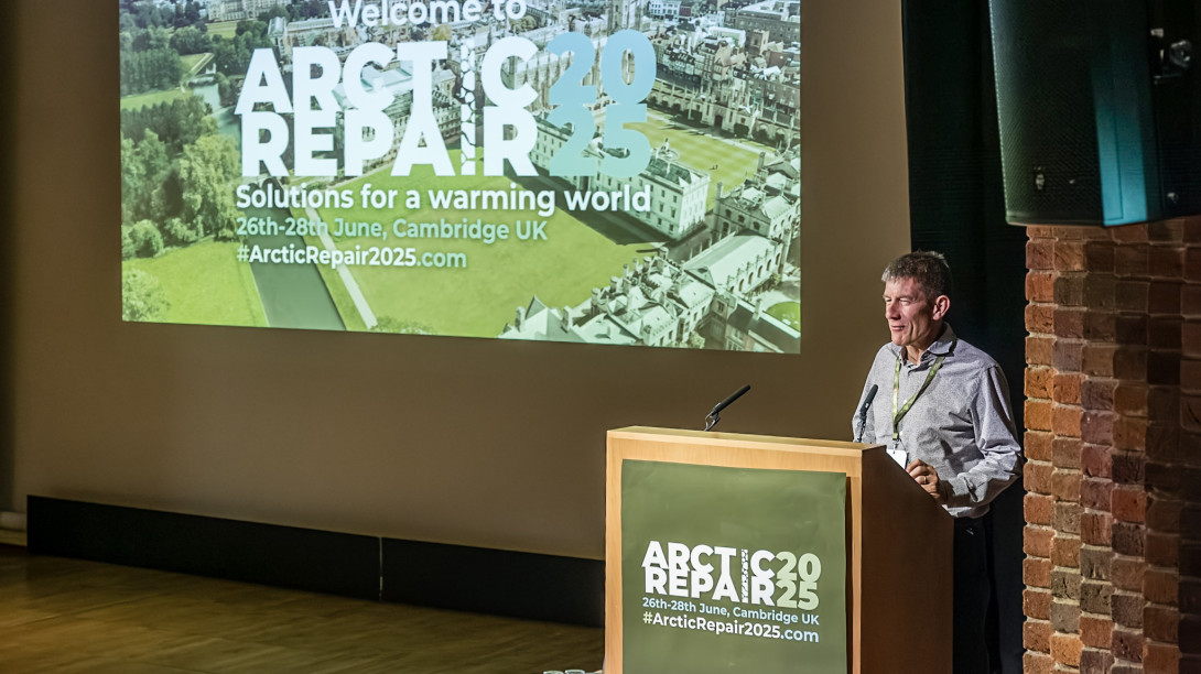 Shaun on stage at conference