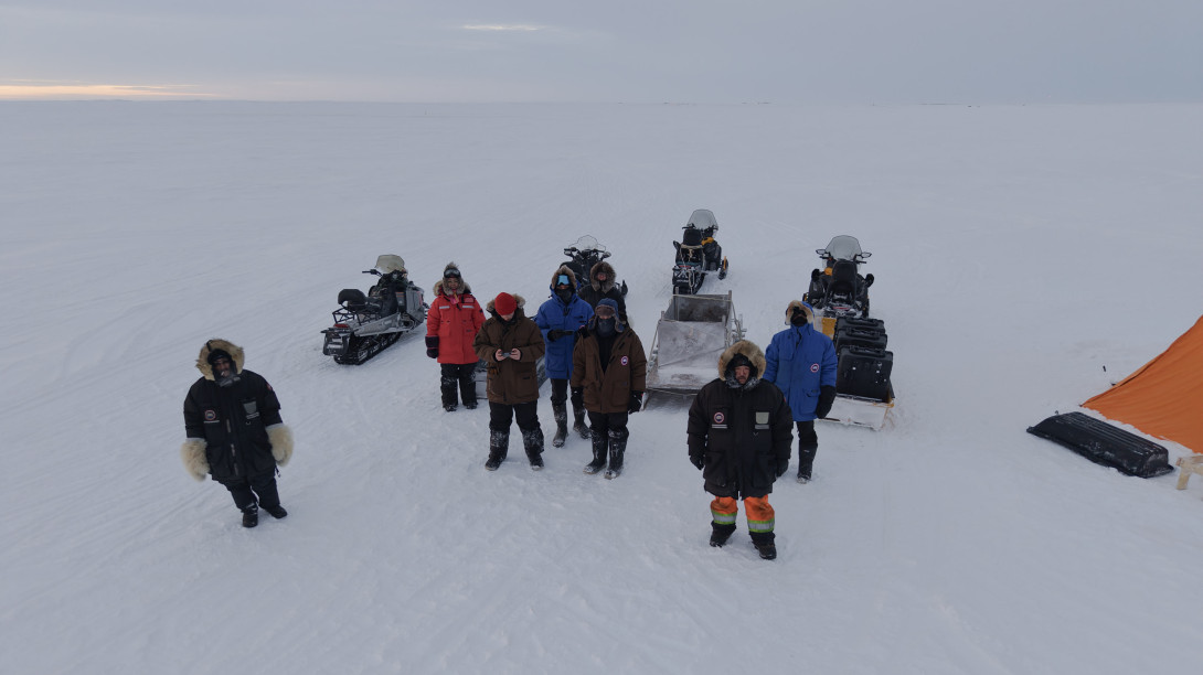 Research team on Arctic ice from above