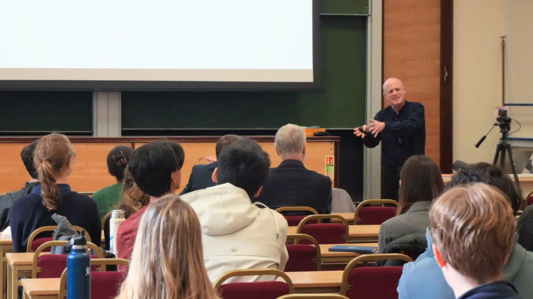 Dan Schrag presenting to audience